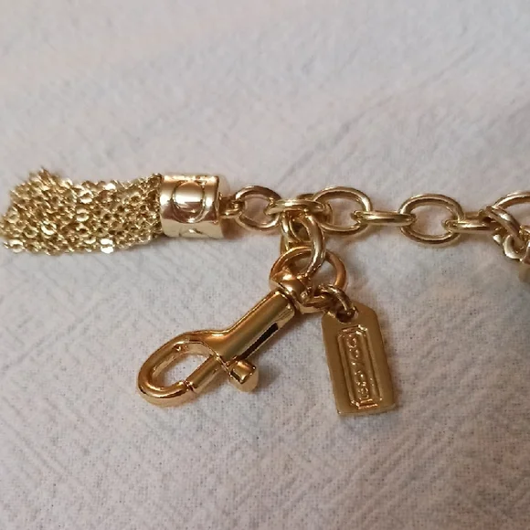 Coach Elegant Gold Tassel Necklace and Bracelet Set - Picture 2 of 8
